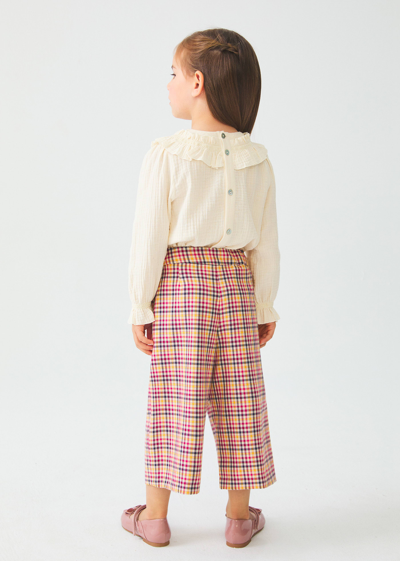 Pantalone modello culotte quadri bambina