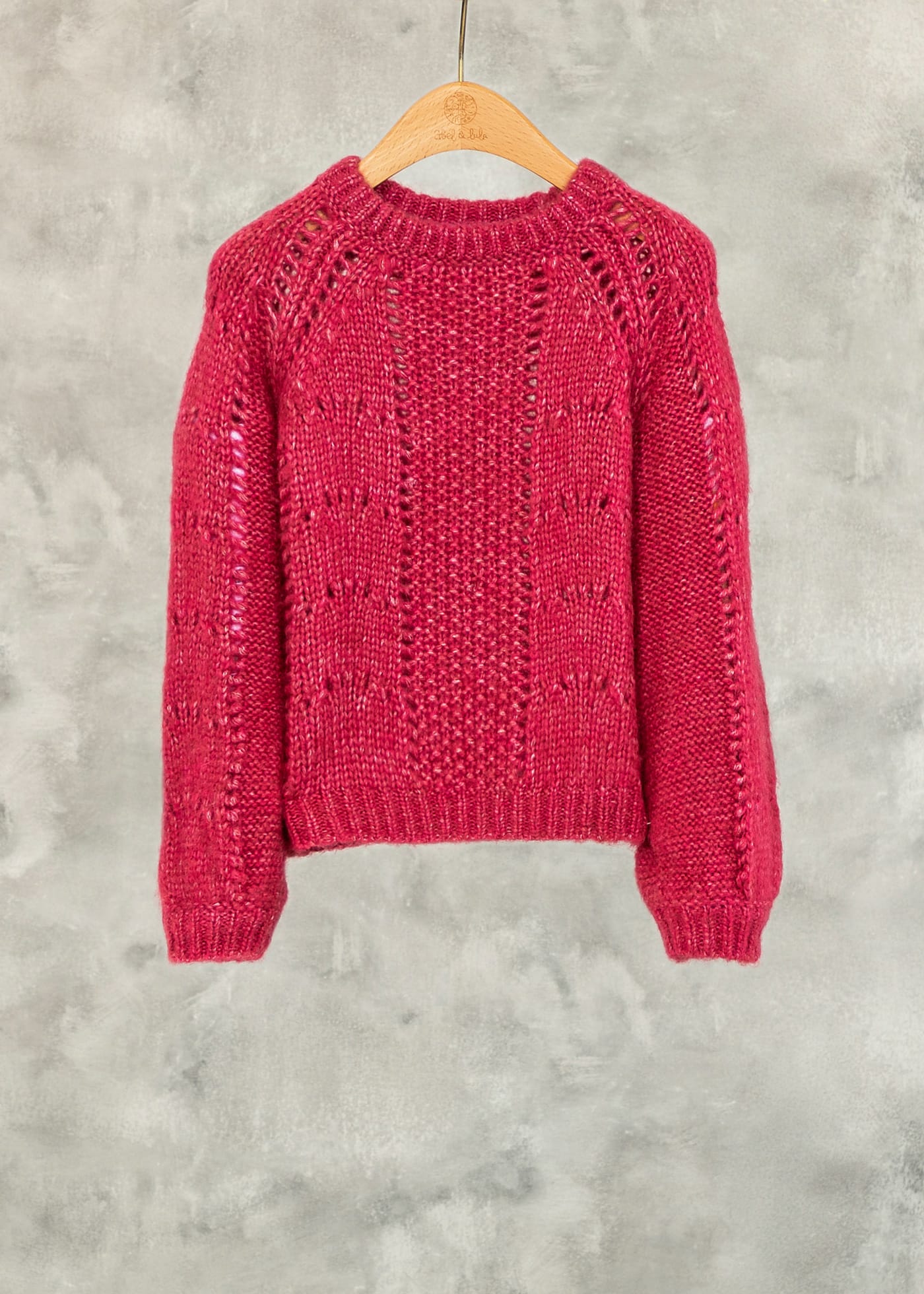 Ażurowy sweter dziewczęcy