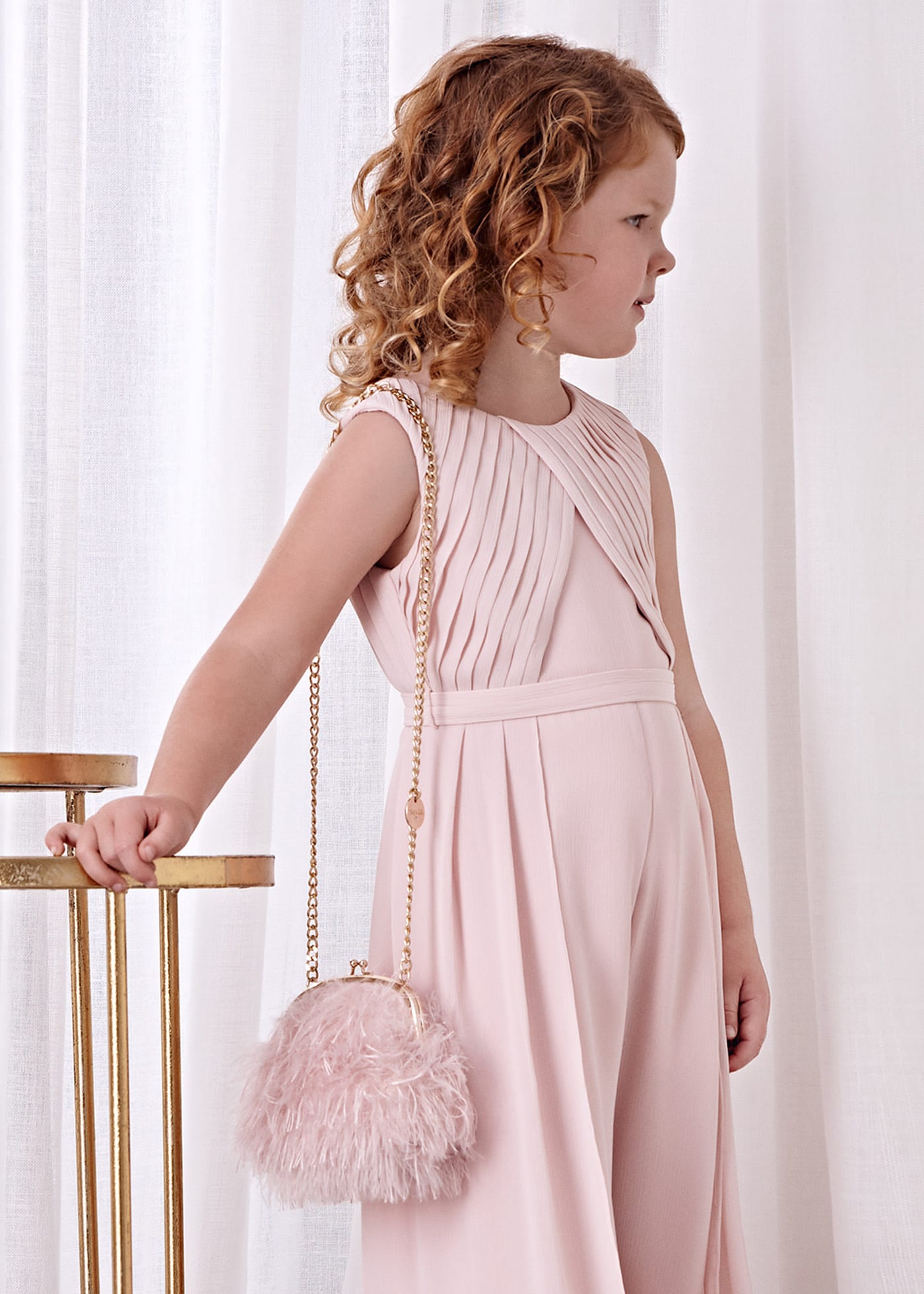 Bolso plumas niña