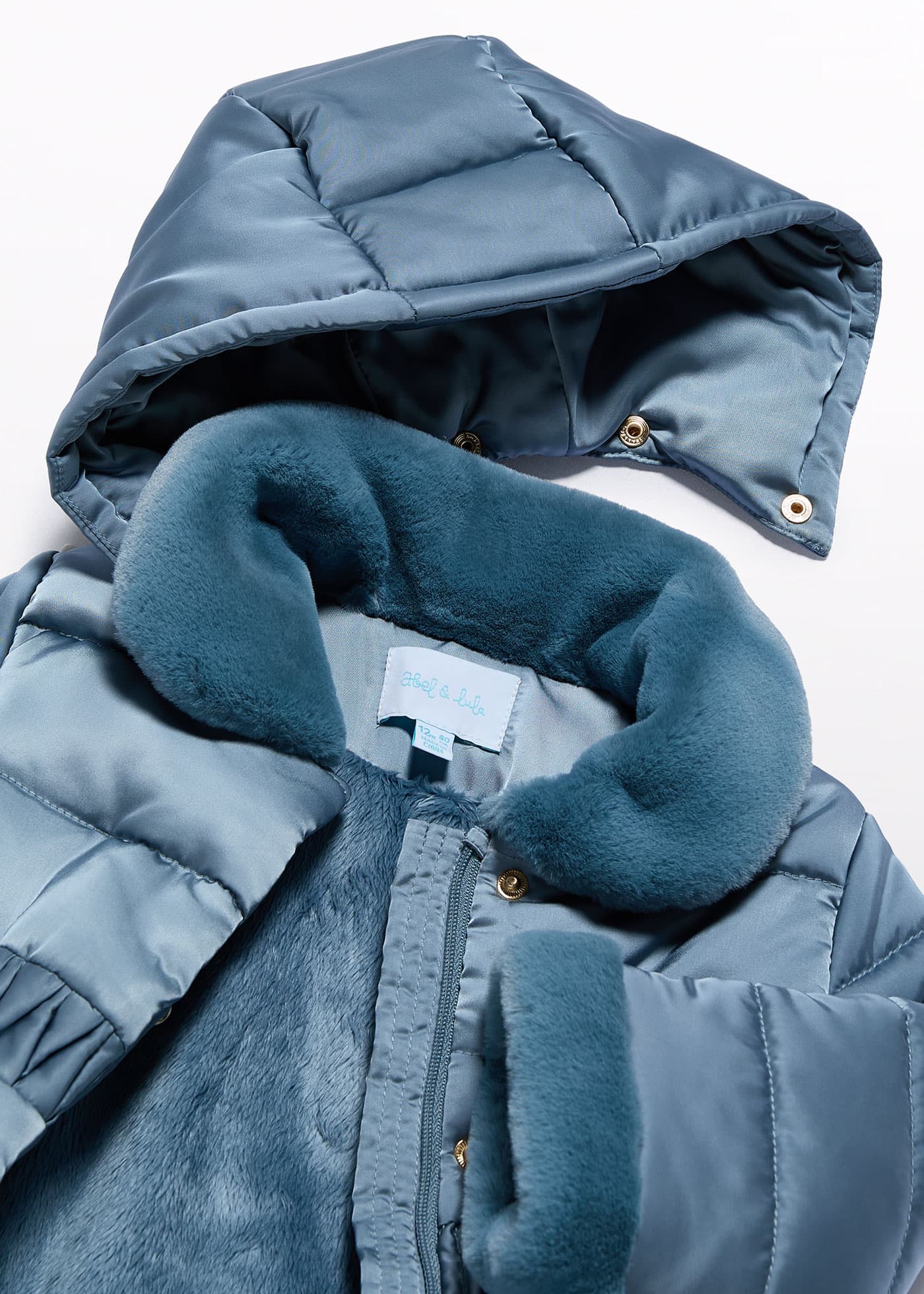 Manteau satiné en fourrure bébé