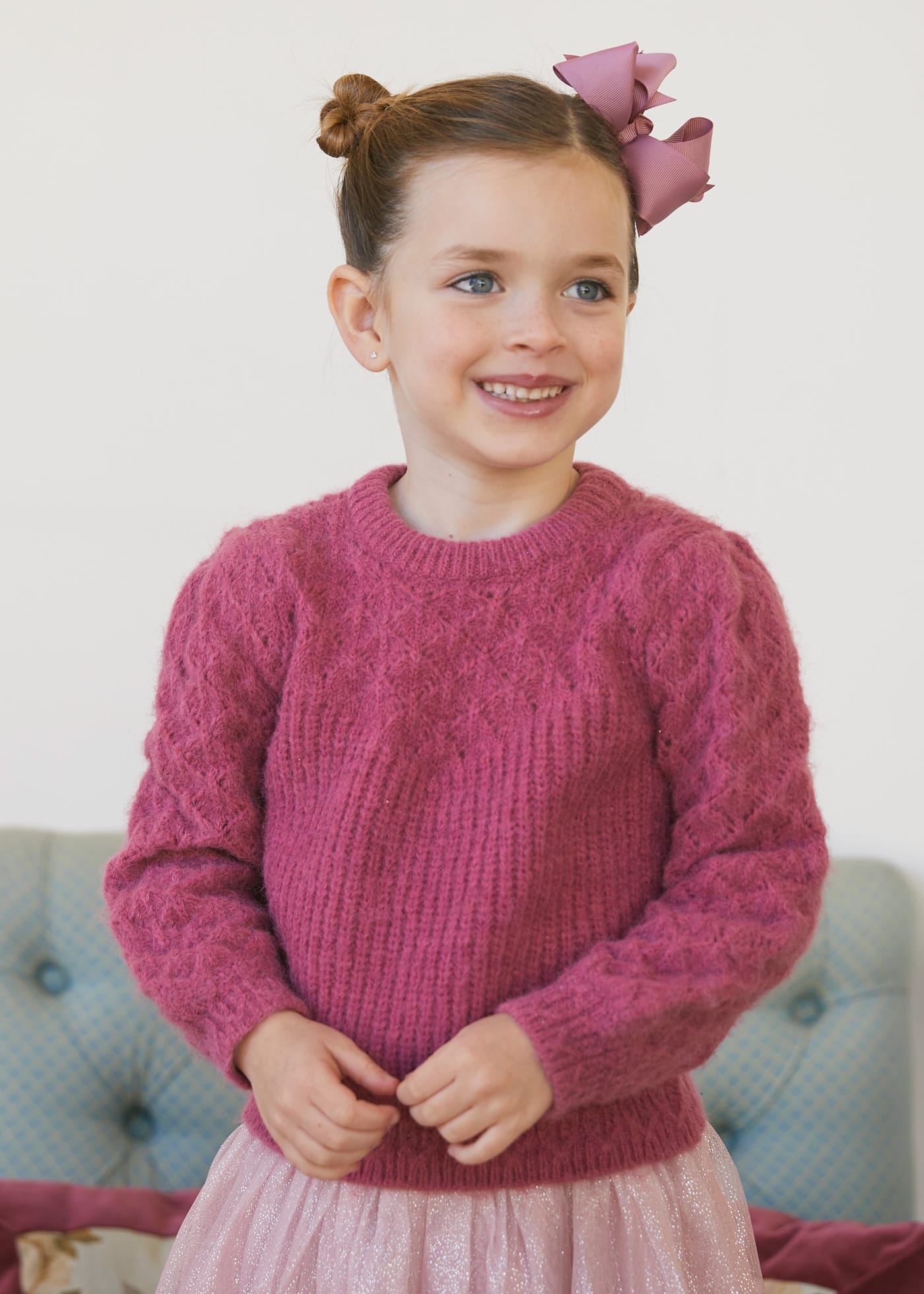 Maglione in maglia traforato bambina