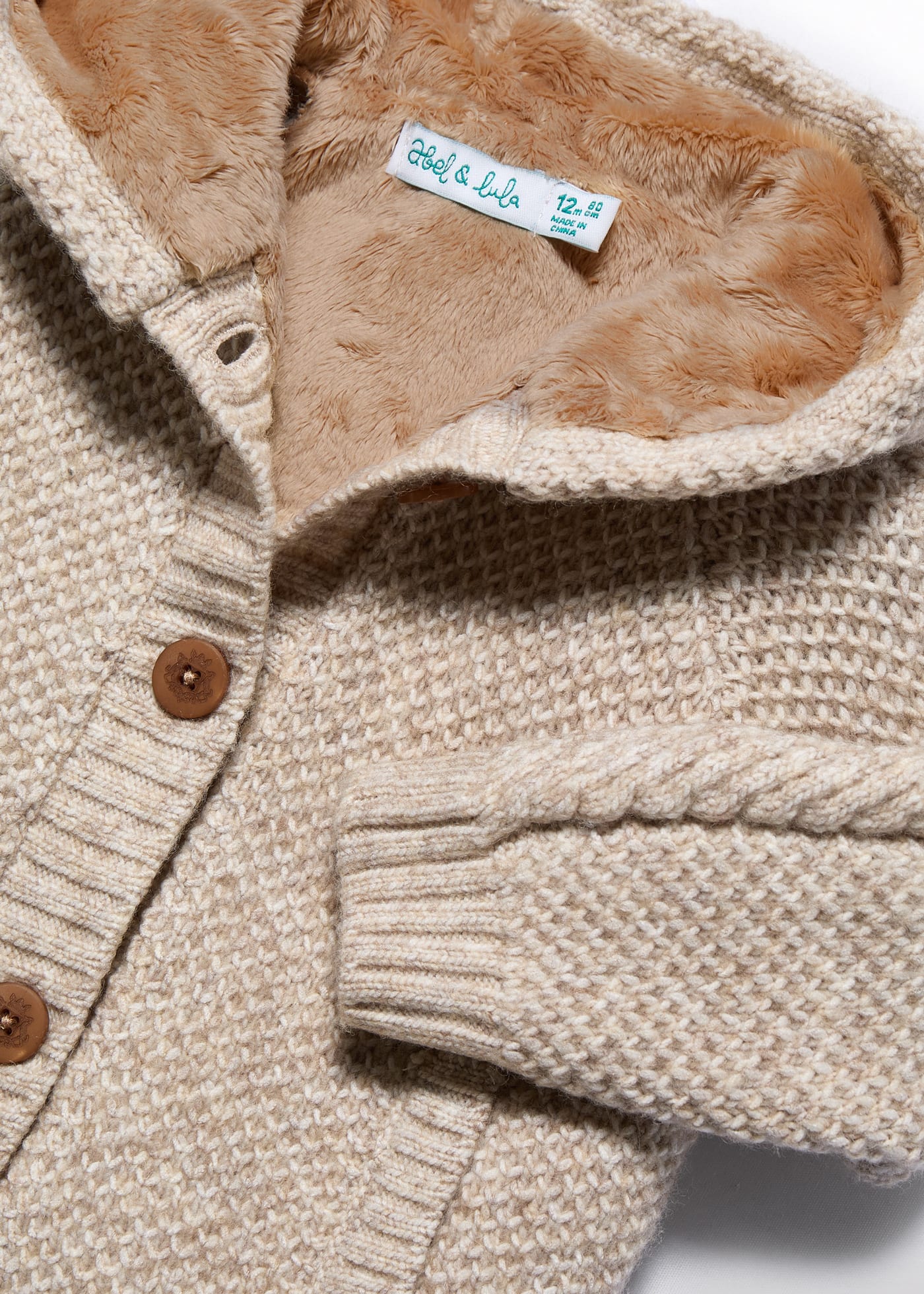 Casaco tricot forrado bebé