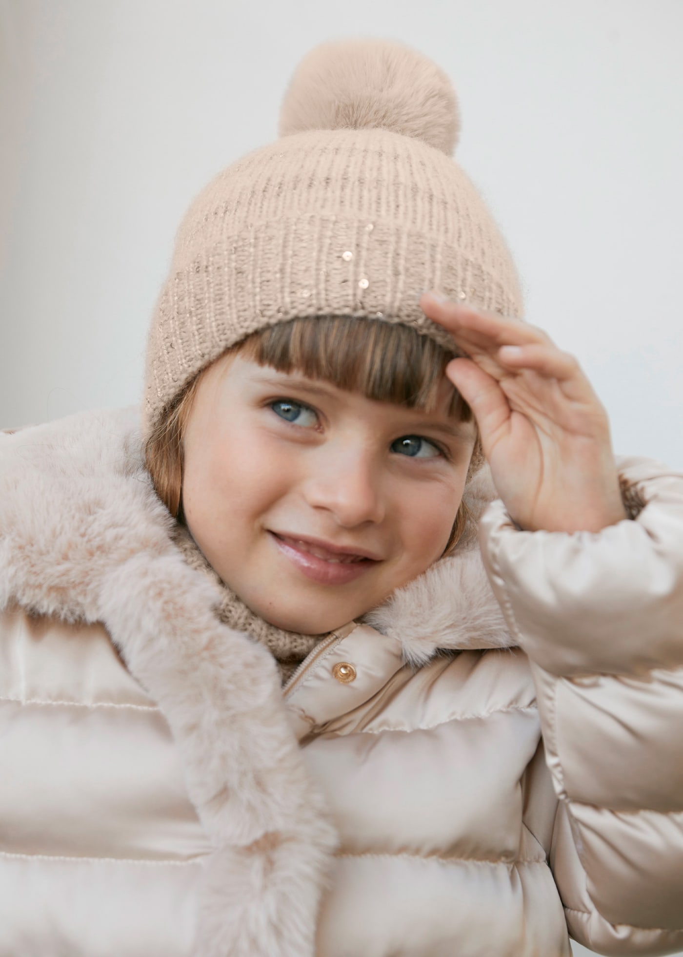 Bonnet rayé à paillettes fille