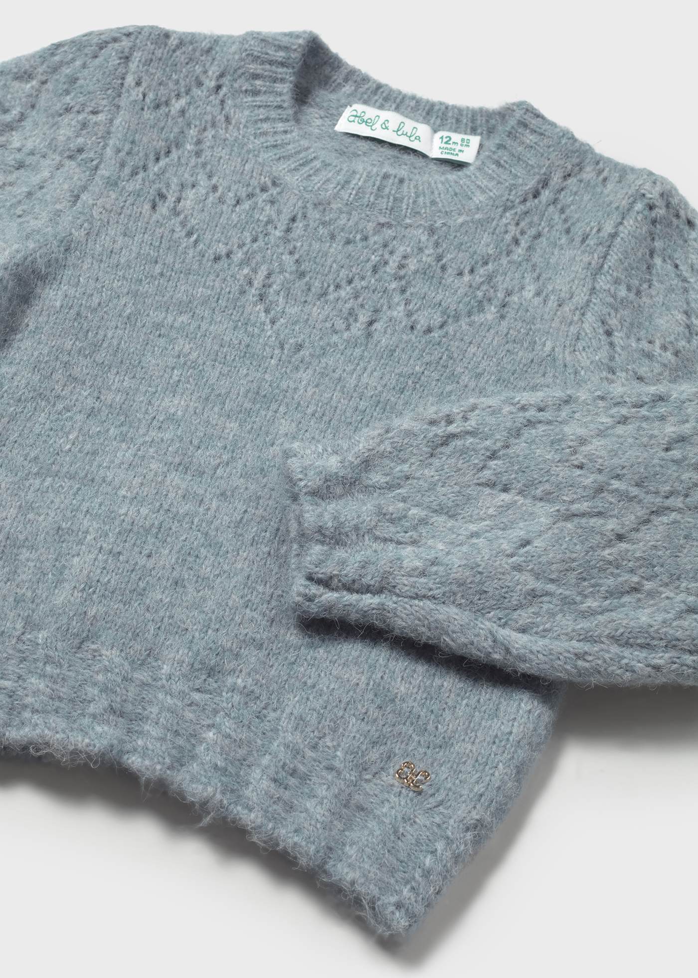 Maglione traforato neonata
