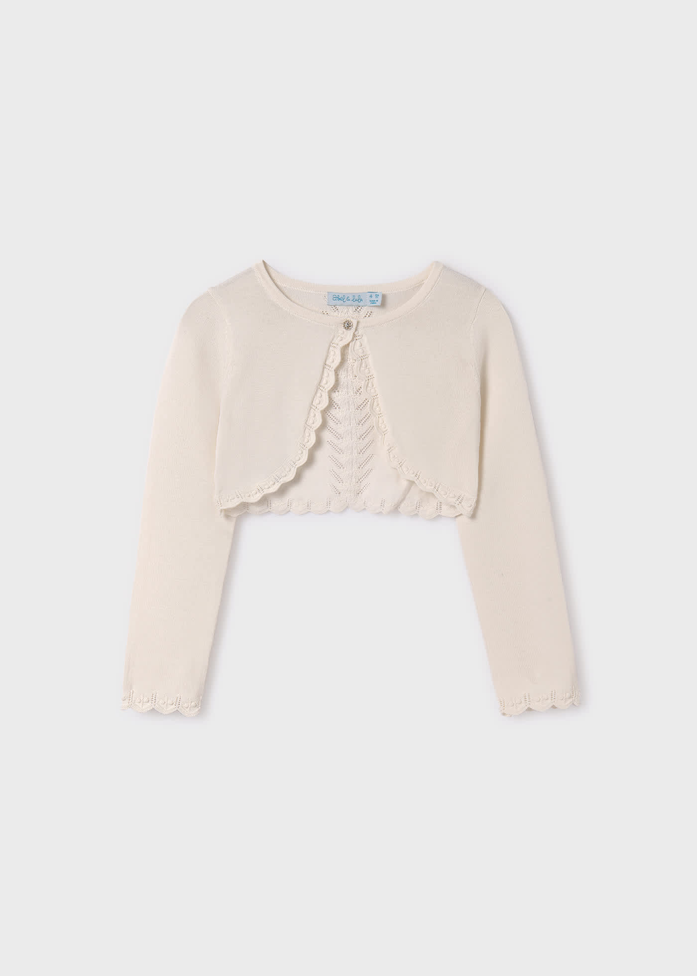 Rebeca tricot tipo bolero niña