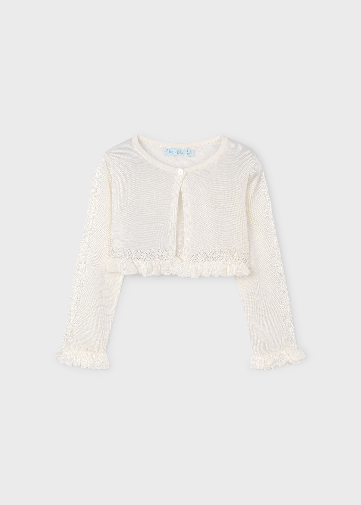 Rebeca tricot tipo bolero niña