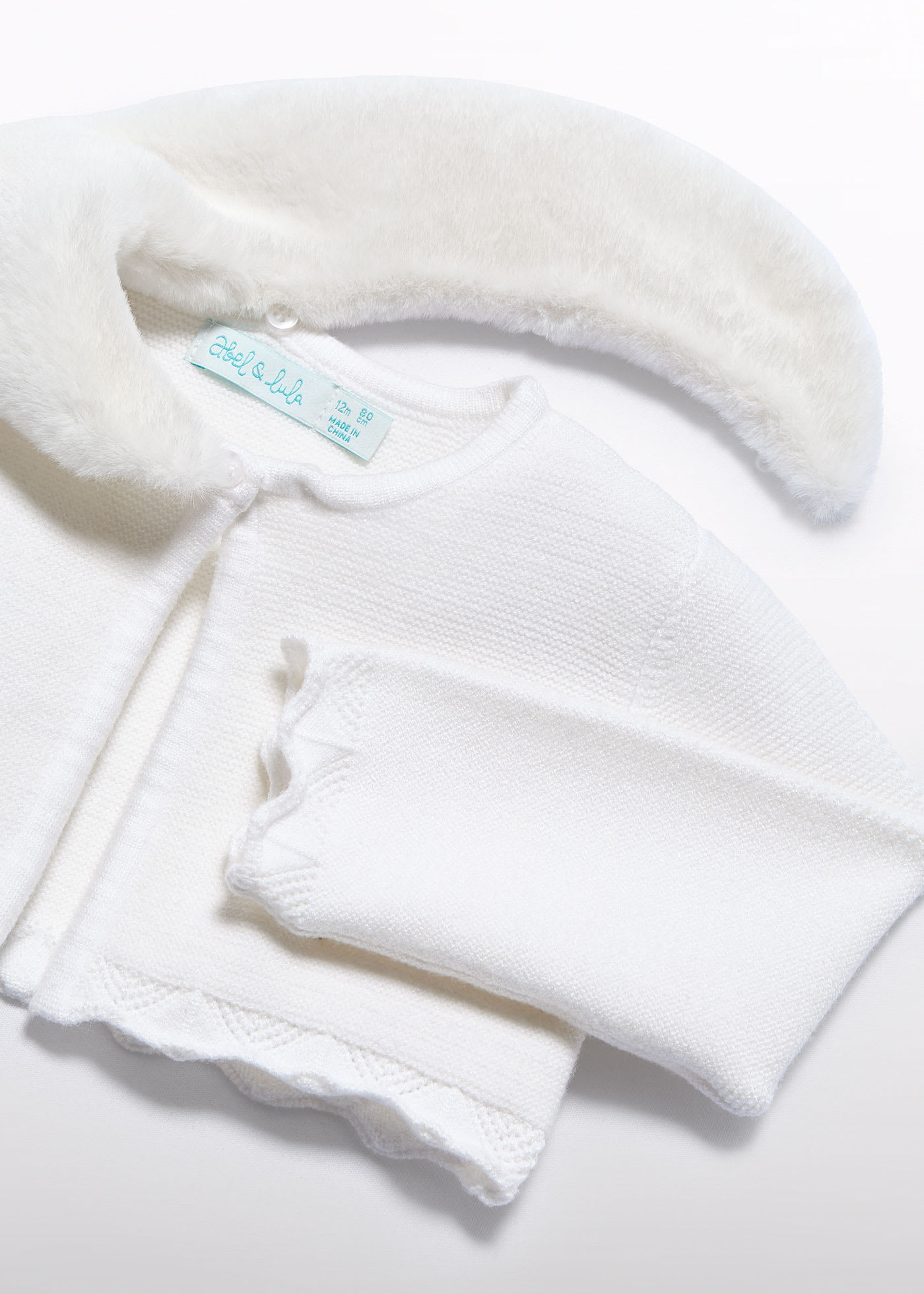 Cardigan tricoté col fourrure bébé fille
