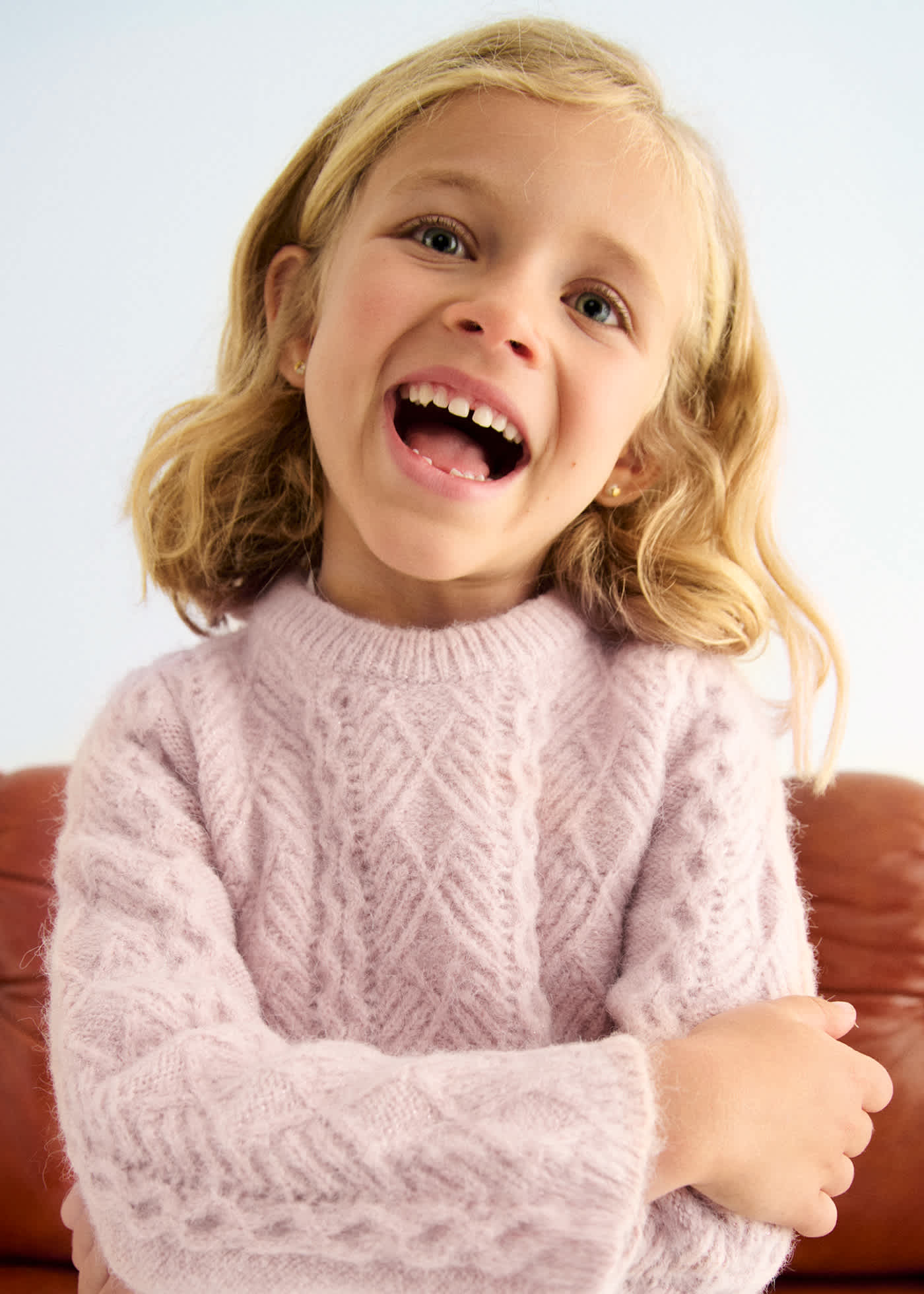 Maglione in maglia trafori onde bambina
