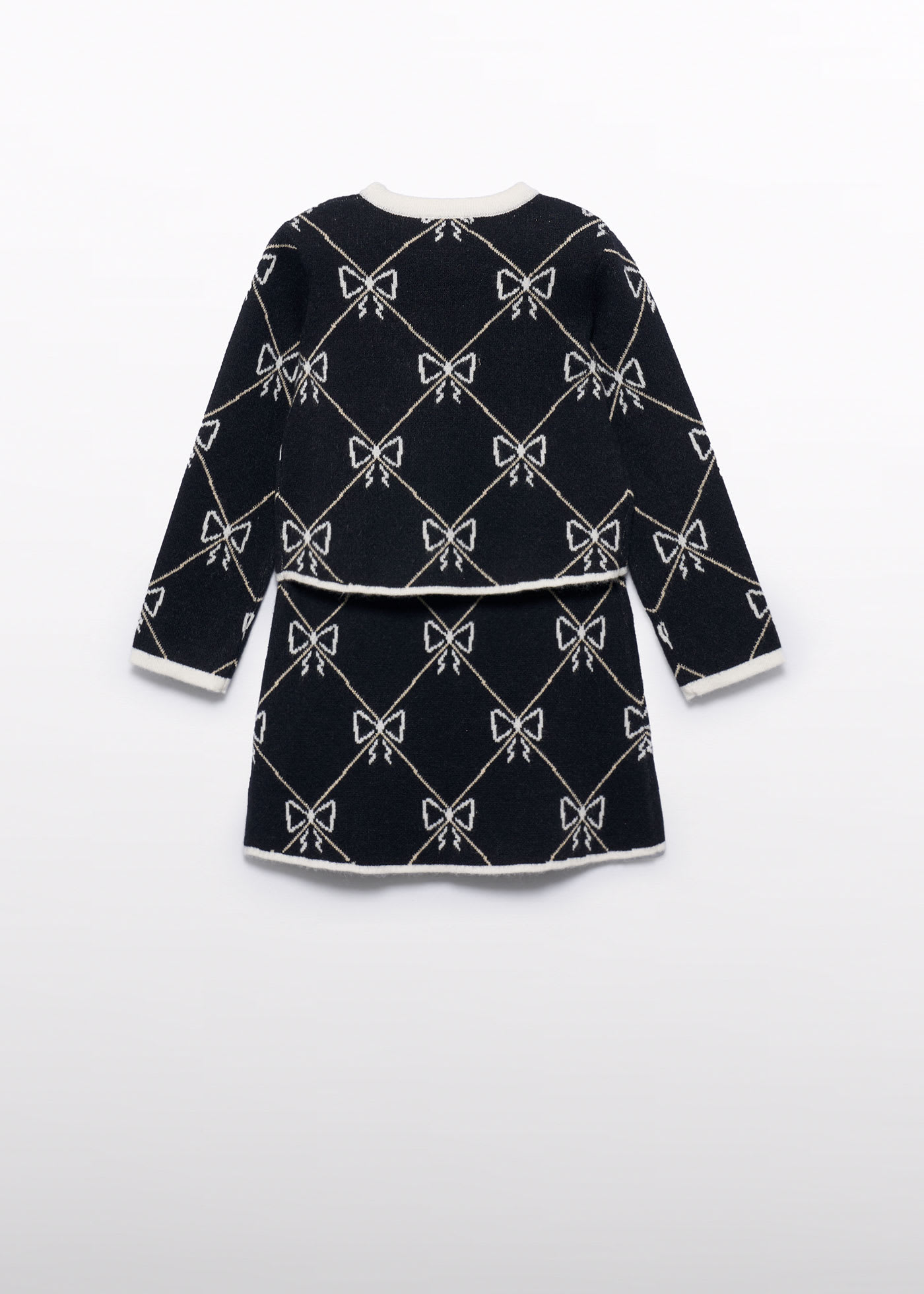 Conjunto tricot falda niña