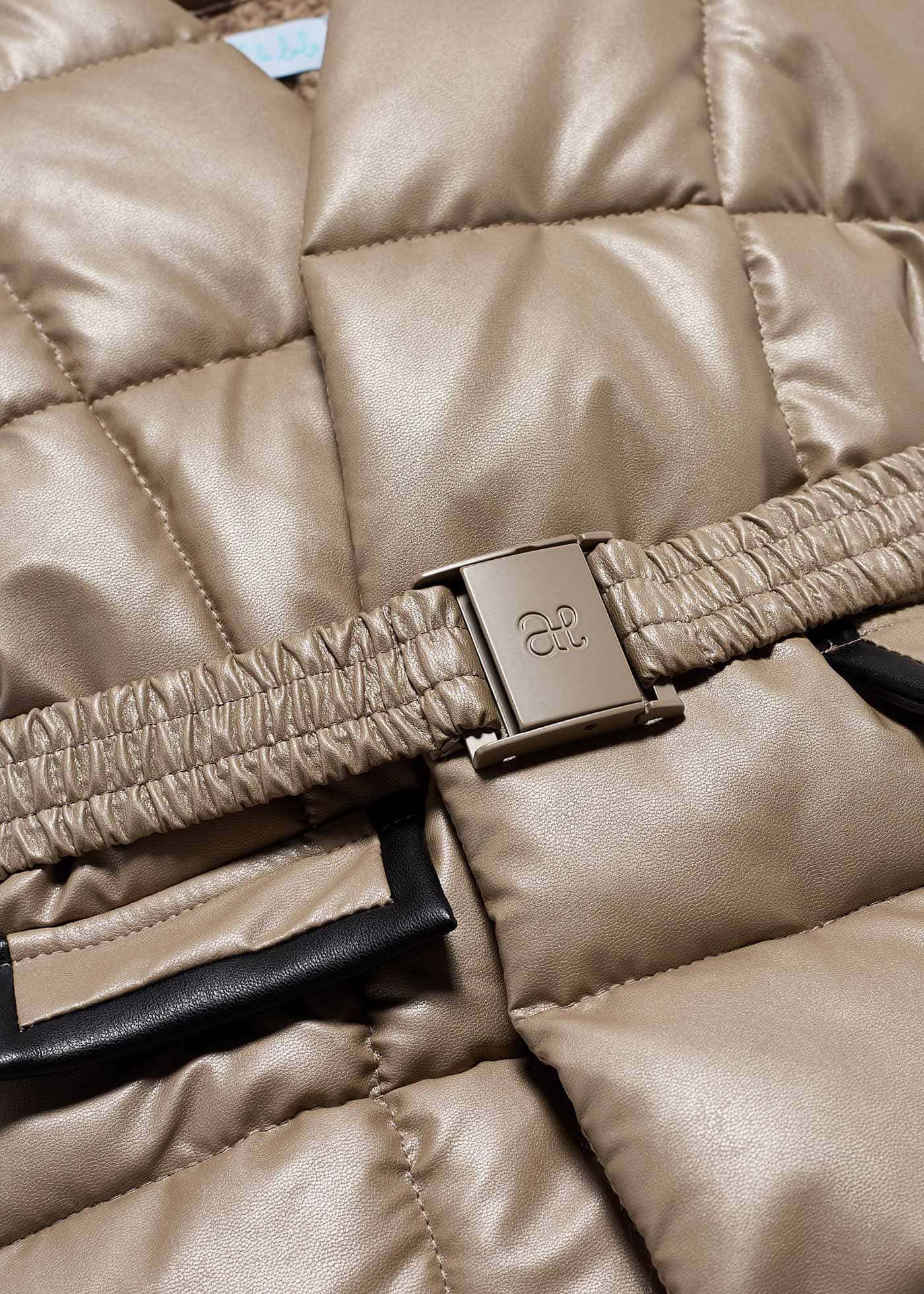 Gilet matelassé en simili-cuir flle