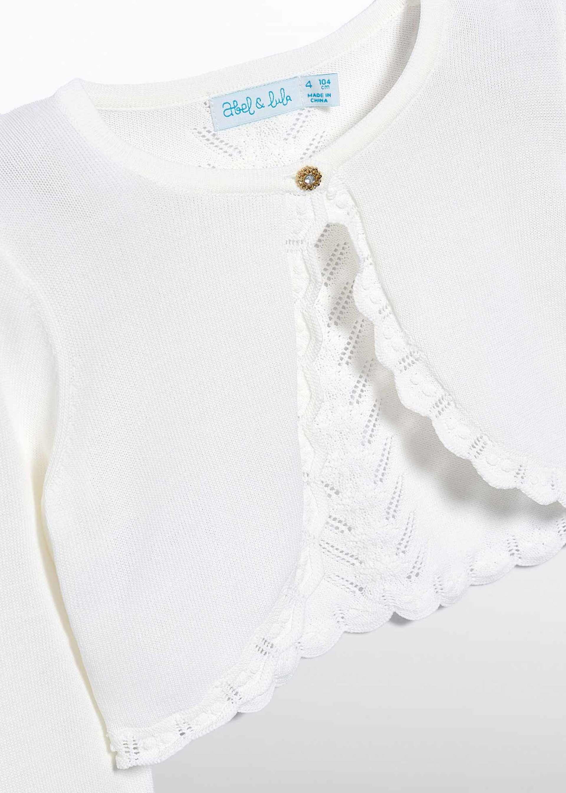 Trykotowy sweterek dziewczęcy