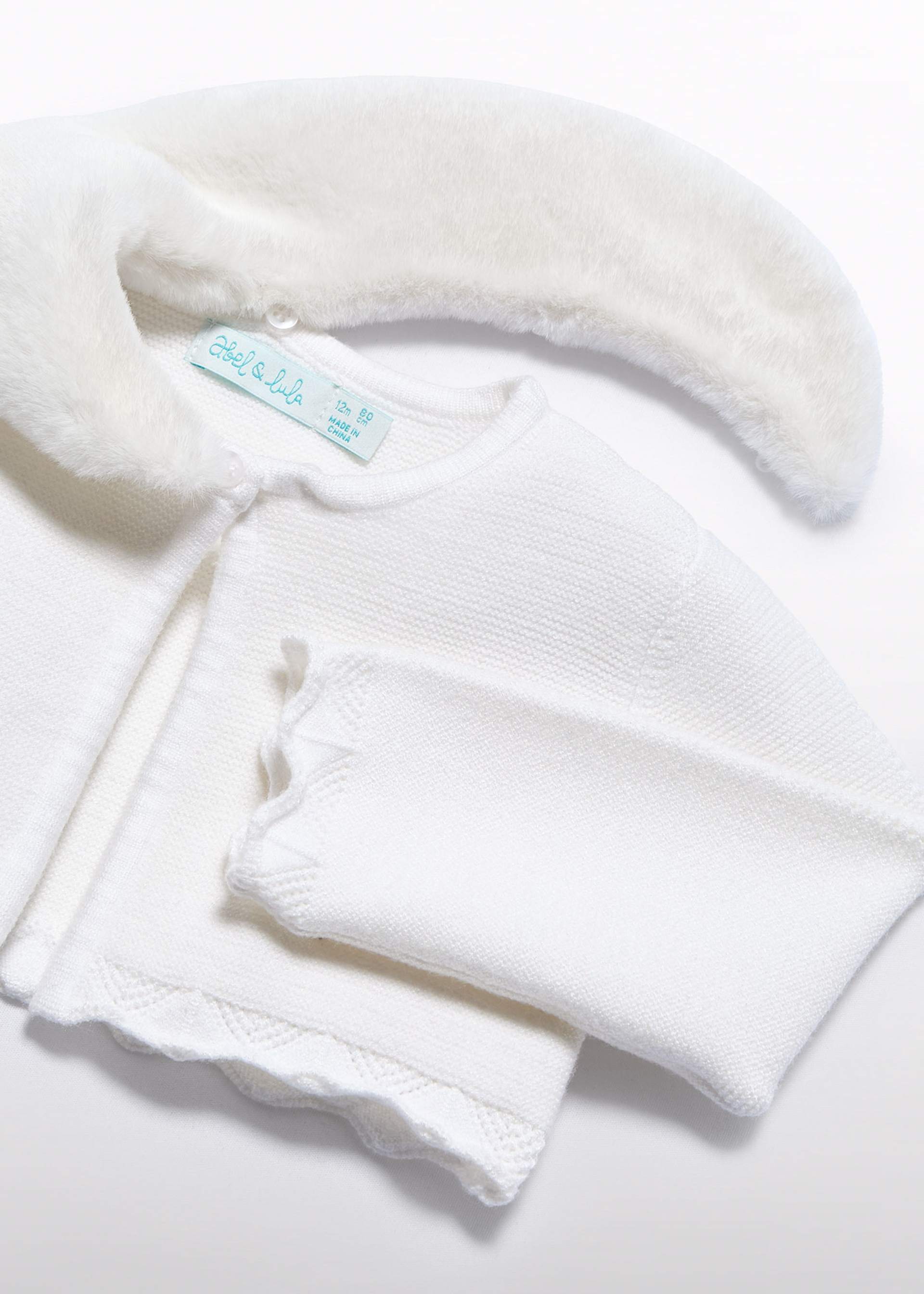 Rebeca tricot cuello pelo bebé niña
