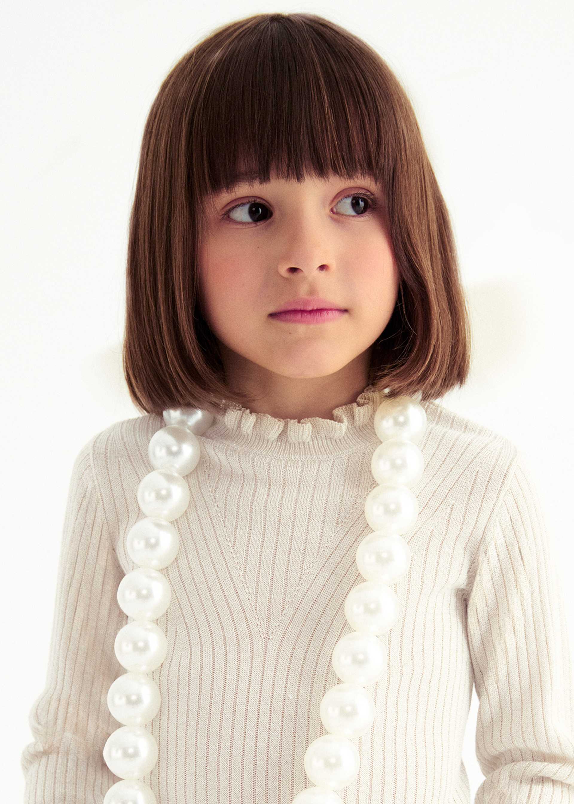 Prążkowany golf trykotowy dla dziewczynki