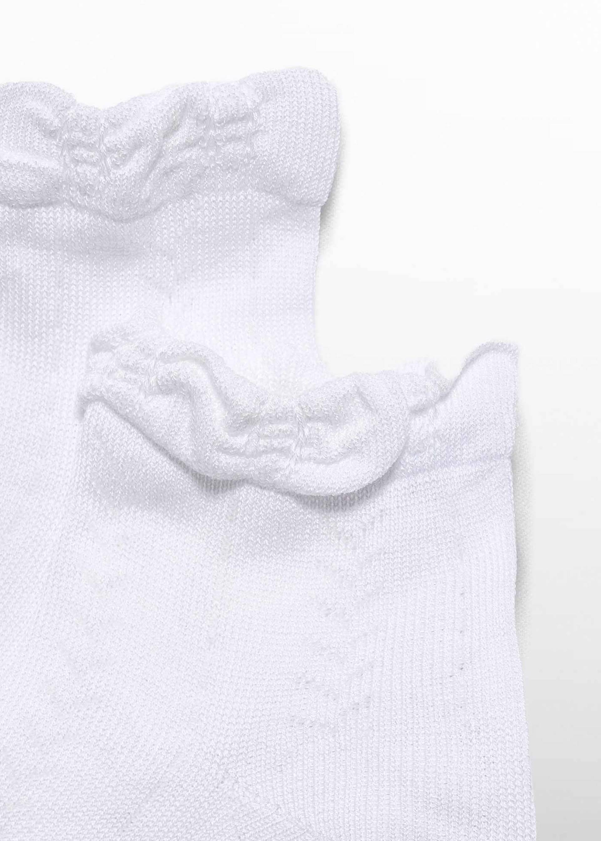 Chaussettes tricotées ajourées fille