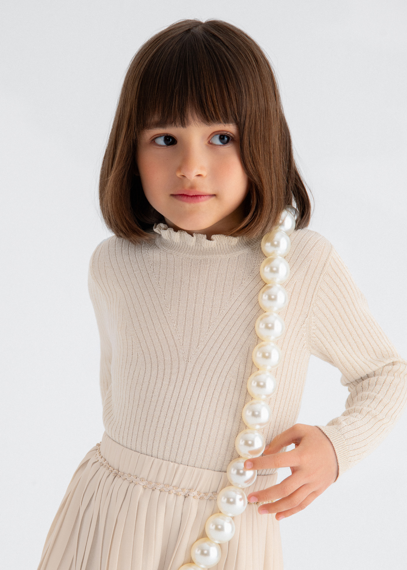 Cisne tricot canalé niña Almendra | Abel & Lula